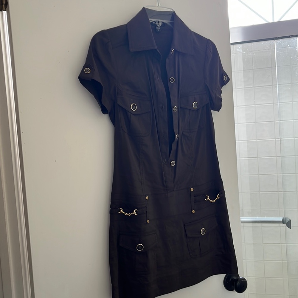 This beautiful dress with gold buttons and little chains worn once.